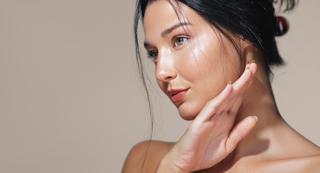 A radiant woman after a facial